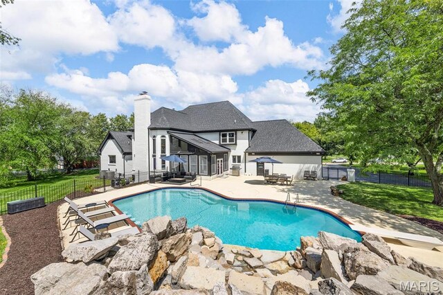13516 Weston Park Dr, Saint Louis, MO 63131 - view of pool featuring a patio area and a sunroom