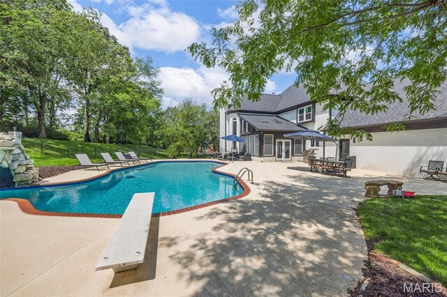 13516 Weston Park Dr, Saint Louis, MO 63131 - view of pool with a patio, a diving board, and a yard