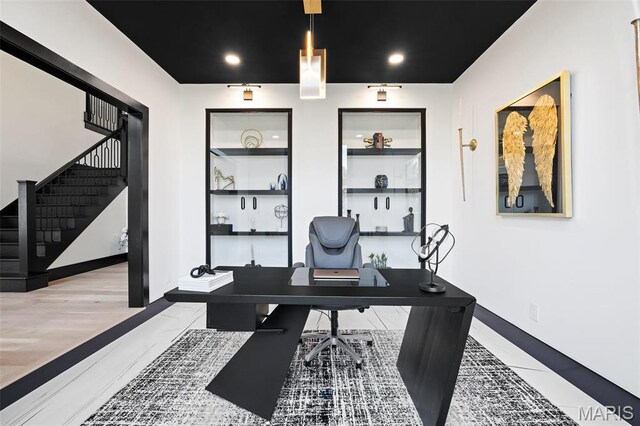 13516 Weston Park Dr, Saint Louis, MO 63131 - office space with baseboards, wood finished floors, recessed lighting, and built in shelves