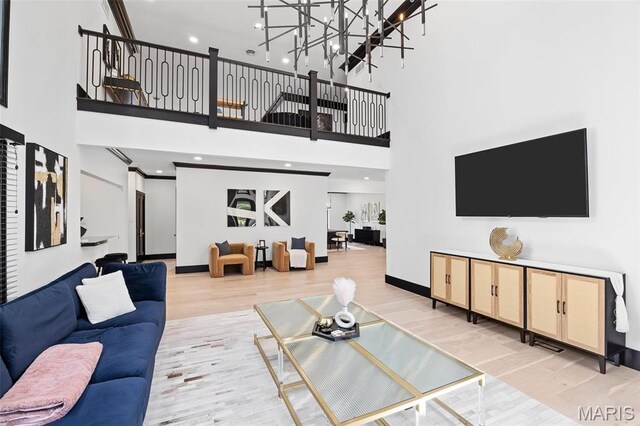 13516 Weston Park Dr, Saint Louis, MO 63131 - living area featuring wood finished floors and a high ceiling