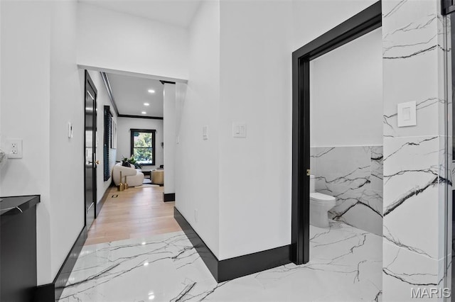 13516 Weston Park Dr, Saint Louis, MO 63131 - hallway with marble tiled floors and recessed lighting