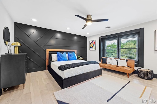 13516 Weston Park Dr, Saint Louis, MO 63131 - bedroom with a decorative wall, light wood finished floors, recessed lighting, and ceiling fan