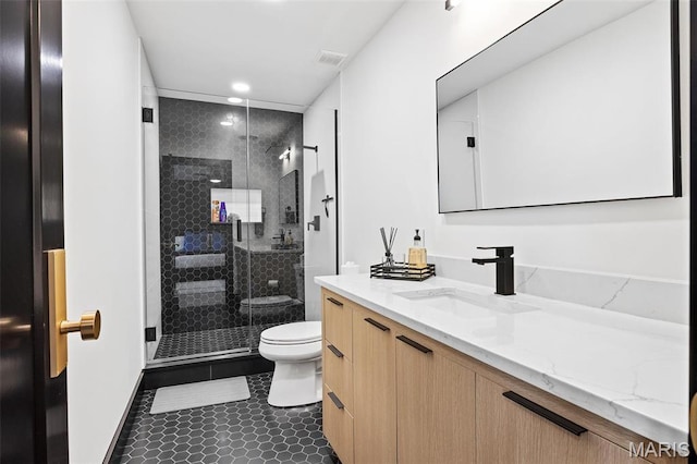 13516 Weston Park Dr, Saint Louis, MO 63131 - bathroom featuring toilet, recessed lighting, a stall shower, vanity, and tile patterned flooring