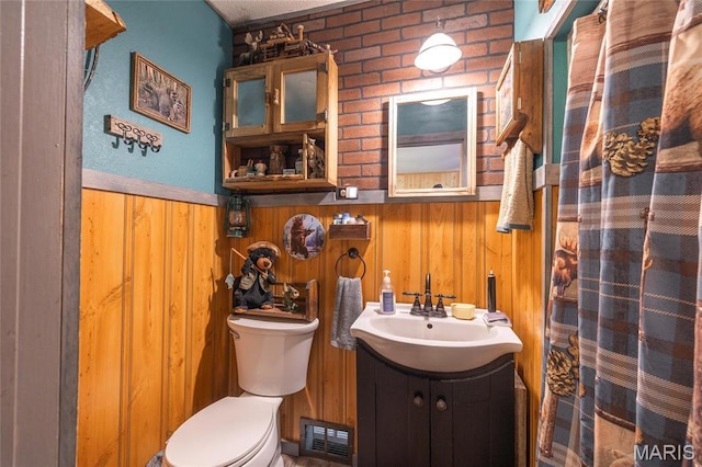 4434 County Road 4110, Salem, MO 65560 - full bath with toilet, wooden walls, a wainscoted wall, and vanity