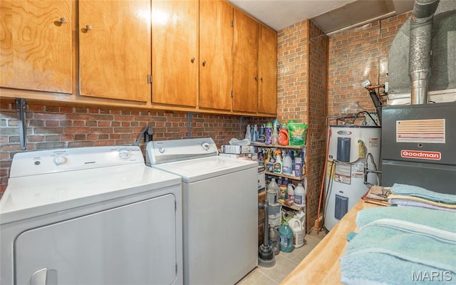 4434 County Road 4110, Salem, MO 65560 - clothes washing area featuring electric water heater, washer and dryer, cabinet space, brick wall, and tile patterned flooring