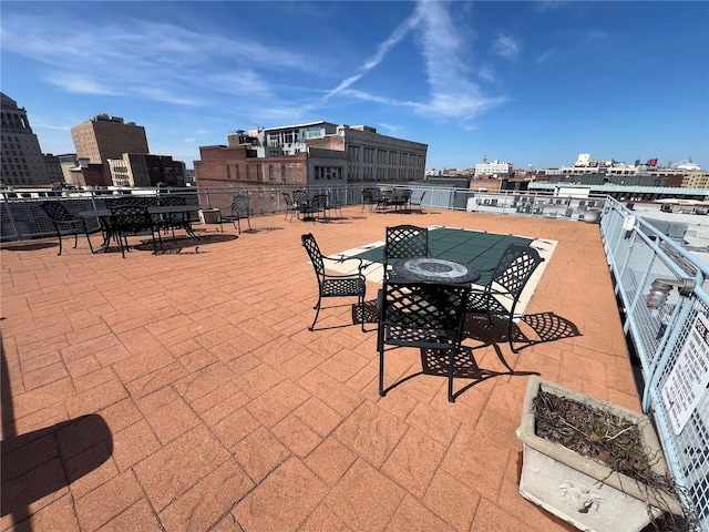 1113 Washington Ave Unit 510, Saint Louis, MO 63101 - view of patio featuring a view of city and outdoor dining space