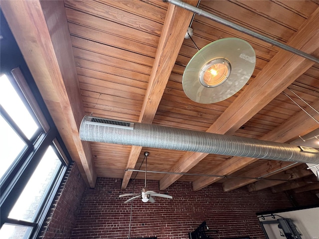 1113 Washington Ave Unit 510, Saint Louis, MO 63101 - detailed view of brick wall, wooden ceiling, and beam ceiling
