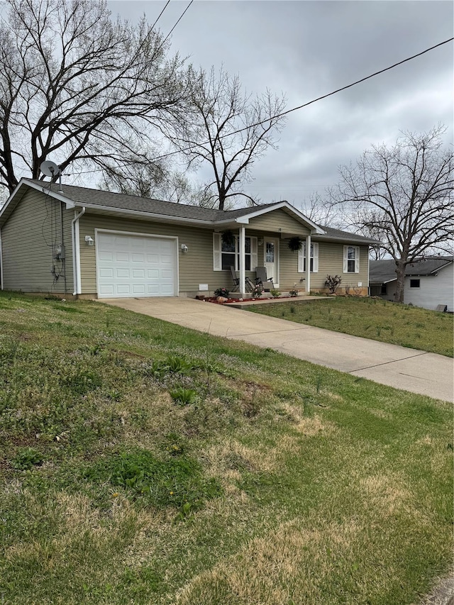 16 Wood St, Park Hills, MO 63601 - ranch-style house featuring an attached garage, covered porch, concrete driveway, and a front yard