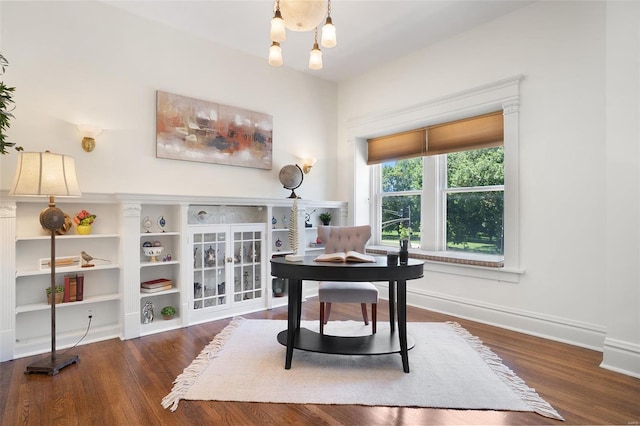 4 N Kingshighway Blvd Unit 4D, Saint Louis, MO 63108 - office area with wood finished floors, baseboards, and a chandelier