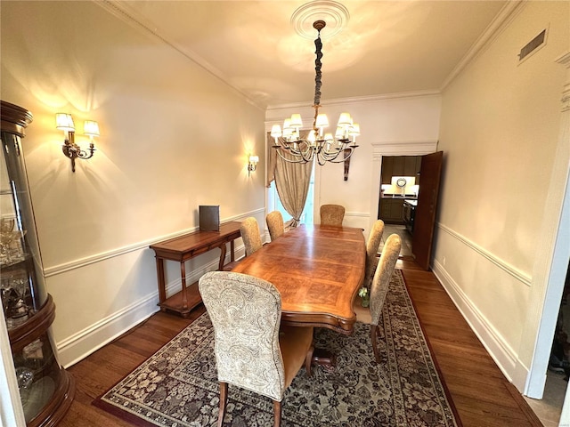4 N Kingshighway Blvd Unit 4D, Saint Louis, MO 63108 - dining room with a chandelier, wood finished floors, crown molding, and baseboards