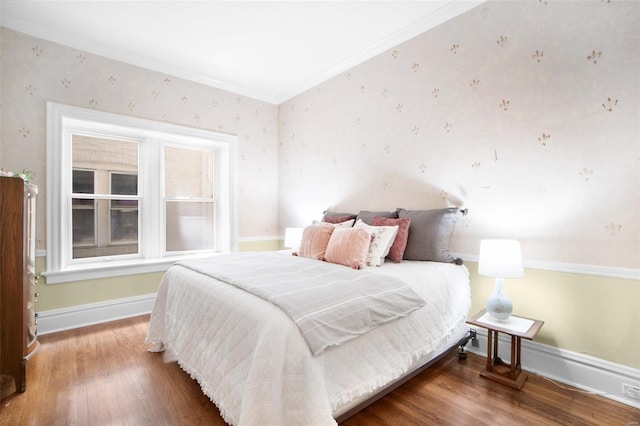 4 N Kingshighway Blvd Unit 4D, Saint Louis, MO 63108 - bedroom with crown molding, wood finished floors, wallpapered walls, and baseboards