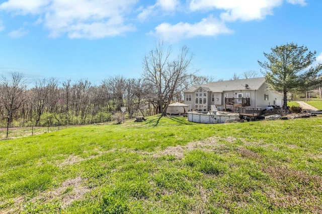21933 Pike 215, Annada, MO 63330 - view of grassy yard with a wooden deck