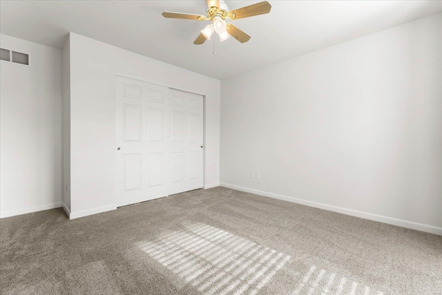 1719 Ambrose Terrace Dr, Swansea, IL 62226 - unfurnished bedroom with carpet floors, baseboards, a ceiling fan, and a closet