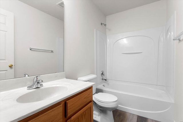 1719 Ambrose Terrace Dr, Swansea, IL 62226 - bathroom with toilet, washtub / shower combination, wood finished floors, and vanity