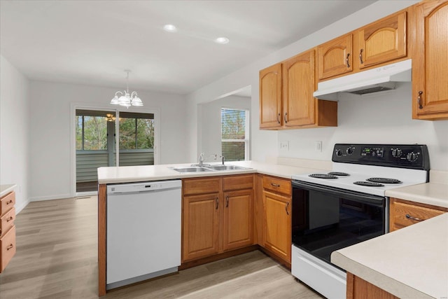 1719 Ambrose Terrace Dr, Swansea, IL 62226 - kitchen with dishwasher, electric range oven, under cabinet range hood, a sink, and a peninsula