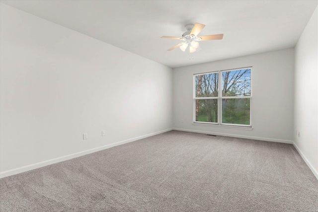 1719 Ambrose Terrace Dr, Swansea, IL 62226 - unfurnished room with carpet, a ceiling fan, and baseboards