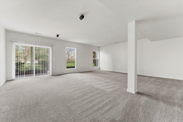 1719 Ambrose Terrace Dr, Swansea, IL 62226 - unfurnished living room featuring carpet flooring and baseboards