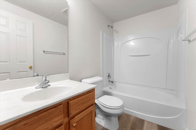 1719 Ambrose Terrace Dr, Swansea, IL 62226 - bathroom with toilet, wood finished floors, vanity, and  shower combination