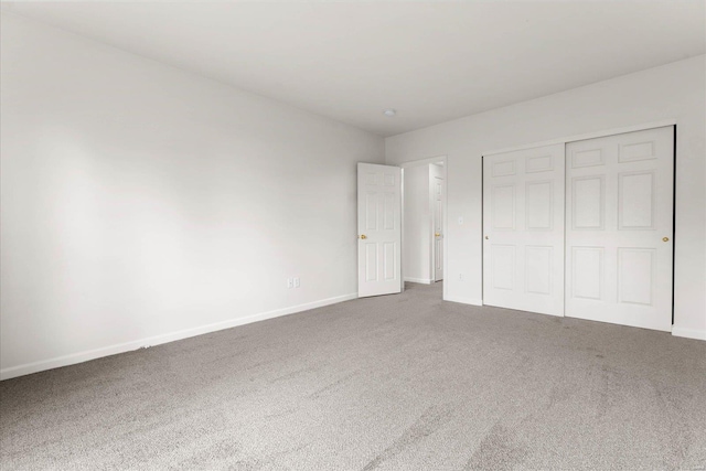 1719 Ambrose Terrace Dr, Swansea, IL 62226 - unfurnished bedroom featuring carpet, baseboards, and a closet