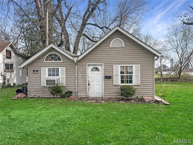 2814 E 24th St, Granite City, IL 62040 - bungalow-style home featuring a front yard and cooling unit