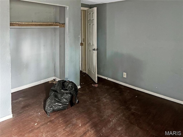 2814 E 24th St, Granite City, IL 62040 - unfurnished bedroom with wood finished floors and baseboards
