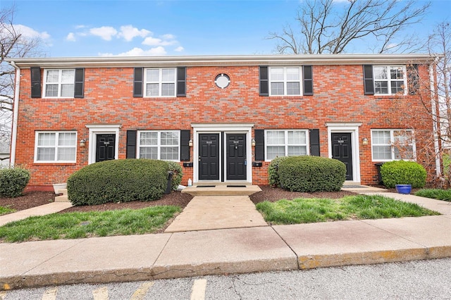 multi unit property featuring brick siding
