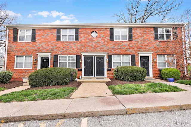 1631 E Swan Cir, Saint Louis, MO 63144 - townhome / multi-family property featuring brick siding
