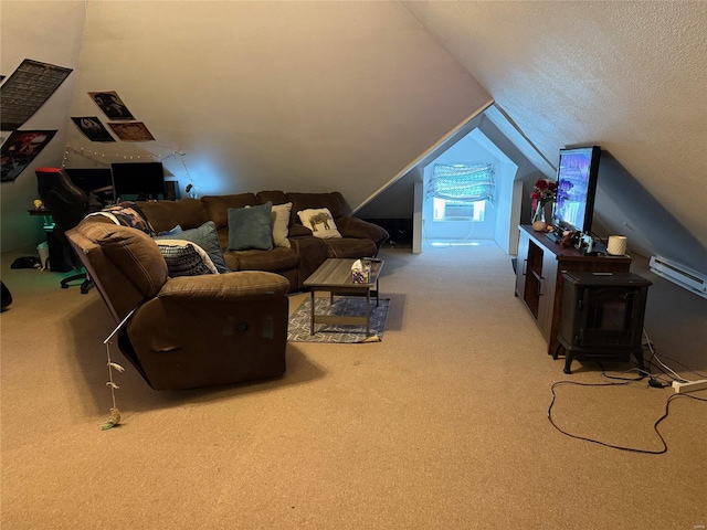carpeted living room with vaulted ceiling, a textured ceiling, and a wood stove