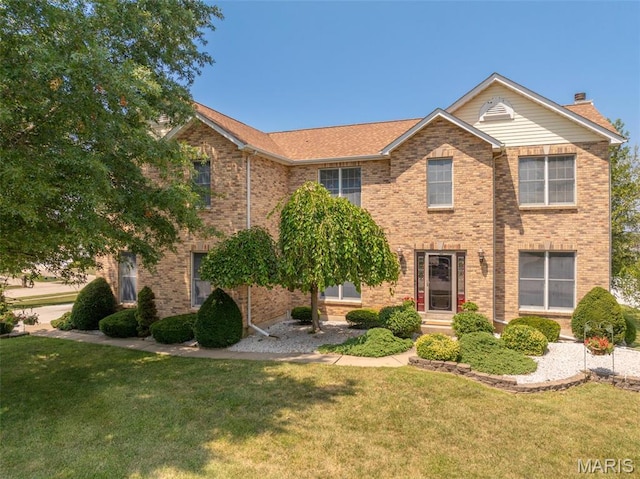 1005 Highland Estates Dr, Wentzville, MO 63385 - view of front of property featuring a front lawn and brick siding