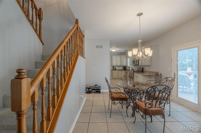 1005 Highland Estates Dr, Wentzville, MO 63385 - dining room with a chandelier, healthy amount of natural light, and stairway