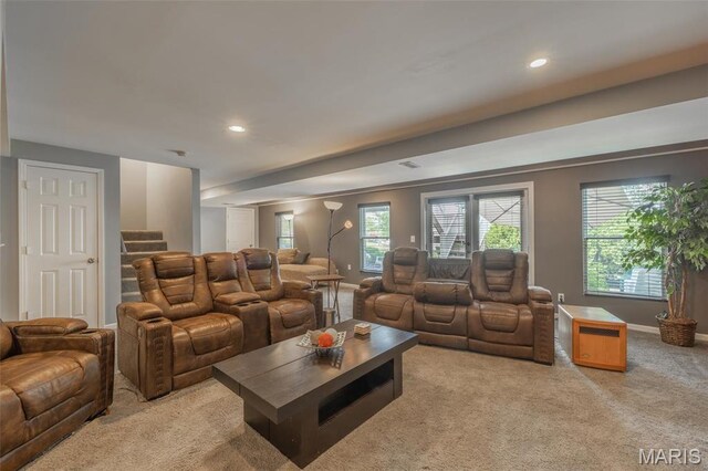 1005 Highland Estates Dr, Wentzville, MO 63385 - living room featuring light colored carpet, stairs, recessed lighting, and baseboards
