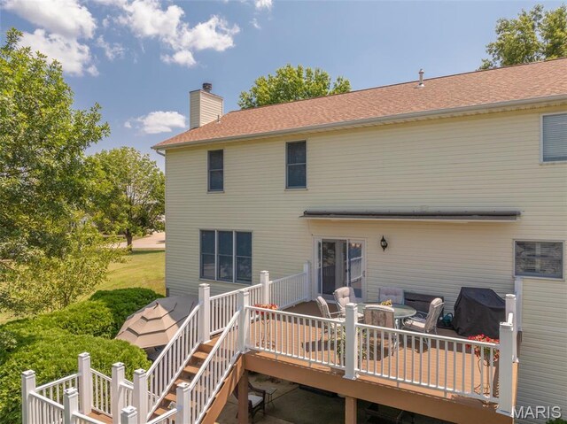 1005 Highland Estates Dr, Wentzville, MO 63385 - back of house with a wooden deck and a chimney