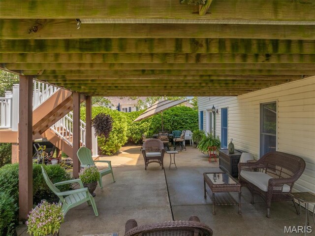 1005 Highland Estates Dr, Wentzville, MO 63385 - view of patio / terrace with an outdoor hangout area and stairway