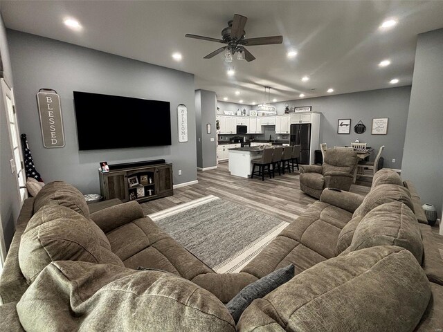 25371 Audrain Road 808, Mexico, MO 65265 - living area featuring ceiling fan, recessed lighting, light wood-style floors, and baseboards