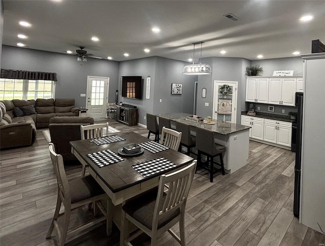 25371 Audrain Road 808, Mexico, MO 65265 - dining area featuring ceiling fan, wood finished floors, and recessed lighting