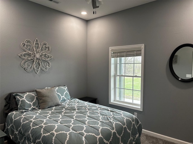 25371 Audrain Road 808, Mexico, MO 65265 - bedroom with carpet, baseboards, and a ceiling fan