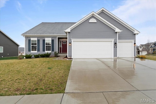 201 Balmoral Gardens Ct, Lake St Louis, MO 63367 - ranch-style house with driveway, an attached garage, and a front yard