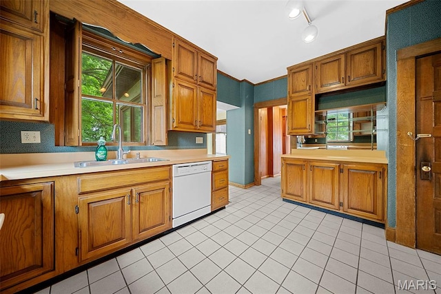 430 Cap Au Gris St, Troy, MO 63379 - kitchen with dishwasher, a sink, light countertops, and brown cabinetry