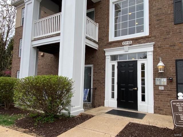 13115 Mill Crossing Ct Unit 106, Saint Louis, MO 63141 - view of exterior entry featuring brick siding