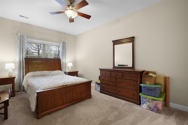 13115 Mill Crossing Ct Unit 106, Saint Louis, MO 63141 - bedroom featuring light carpet, baseboards, and ceiling fan