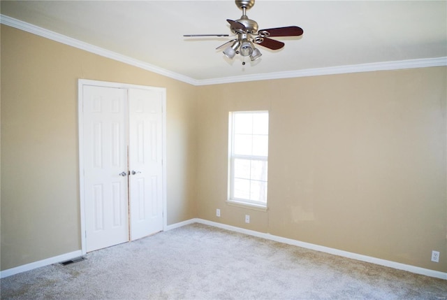 1077 Creech School Rd, Troy, MO 63379 - unfurnished bedroom with carpet flooring, crown molding, baseboards, a closet, and ceiling fan