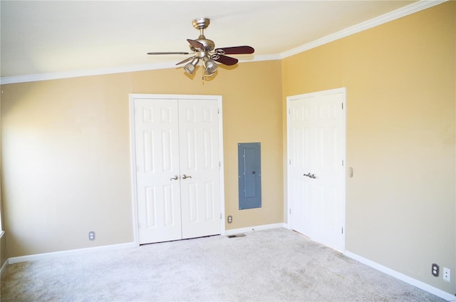 1077 Creech School Rd, Troy, MO 63379 - unfurnished bedroom featuring carpet, electric panel, ornamental molding, a closet, and baseboards