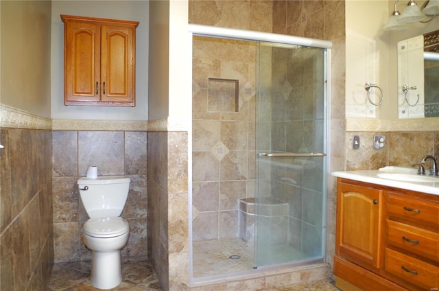 1077 Creech School Rd, Troy, MO 63379 - full bath featuring tile walls, a shower stall, toilet, vanity, and wainscoting