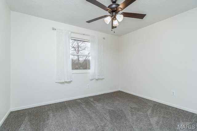 212 Tremont Dr, Waynesville, MO 65583 - carpeted spare room with baseboards and ceiling fan