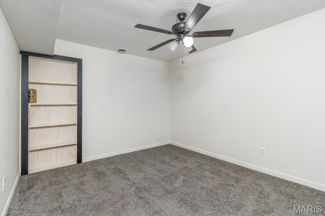 212 Tremont Dr, Waynesville, MO 65583 - carpeted empty room with ceiling fan, baseboards, and a textured ceiling