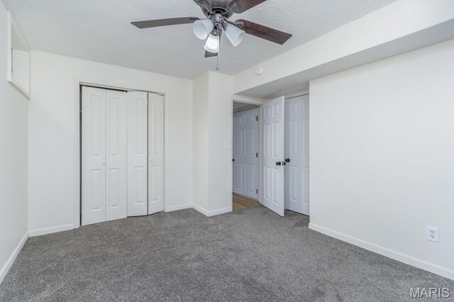 212 Tremont Dr, Waynesville, MO 65583 - unfurnished bedroom featuring carpet flooring, baseboards, a textured ceiling, and ceiling fan