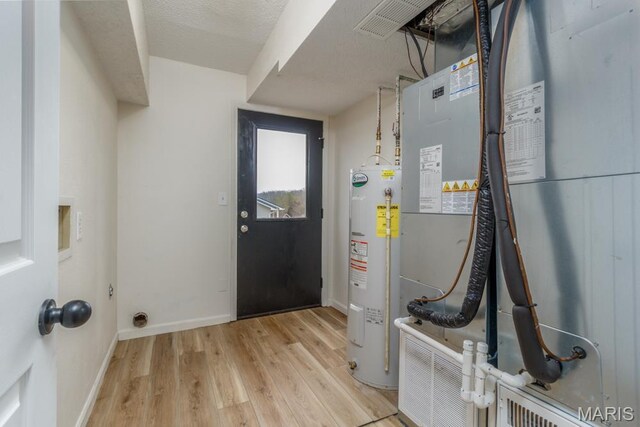 212 Tremont Dr, Waynesville, MO 65583 - utilities with water heater and heating unit