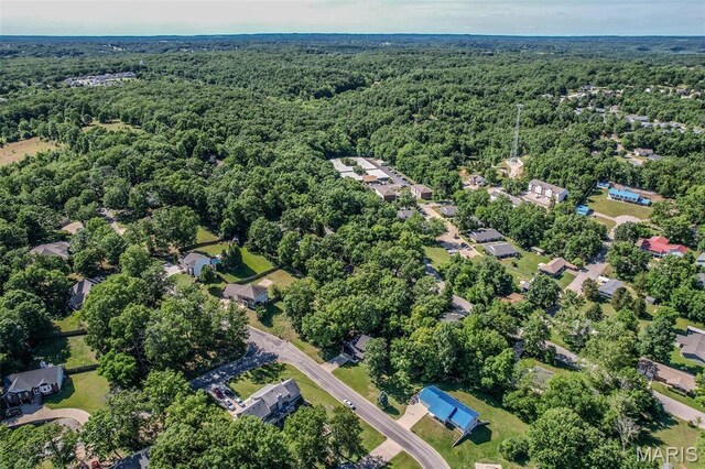 212 Tremont Dr, Waynesville, MO 65583 - aerial overview of property's location featuring a heavily wooded area