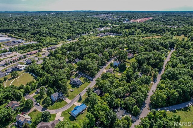 212 Tremont Dr, Waynesville, MO 65583 - aerial overview of property's location featuring a heavily wooded area