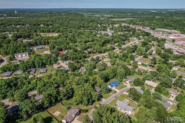 212 Tremont Dr, Waynesville, MO 65583 - aerial view of property and surrounding area featuring a heavily wooded area
